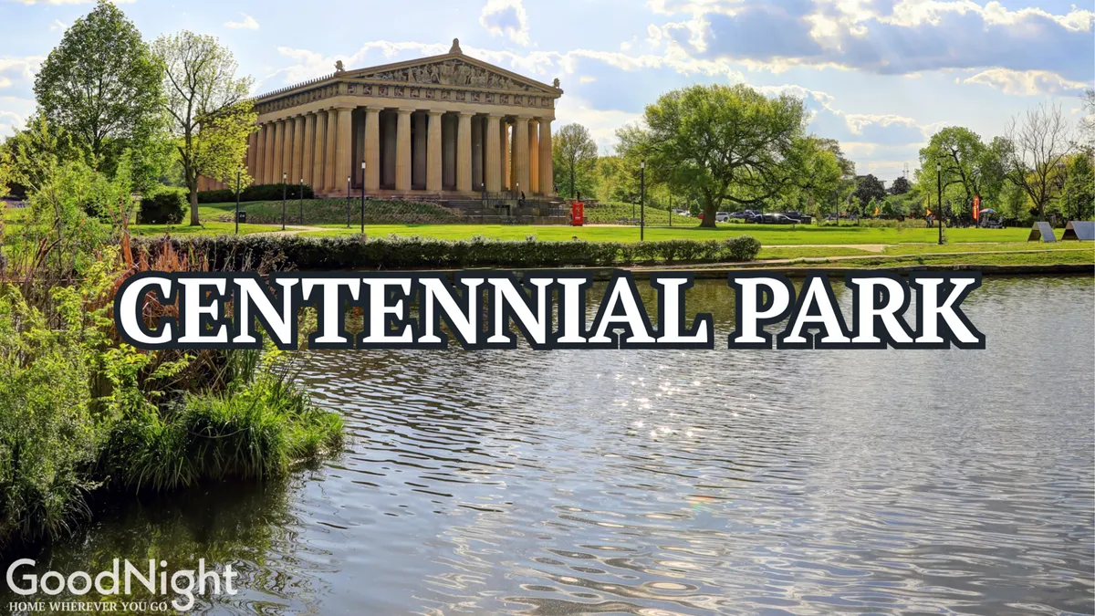 This image features the iconic Parthenon replica set beside a serene lake in Centennial Park, surrounded by lush greenery. The scene invites outdoor activities such as walking, picnicking, and enjoying photo opportunities, with the monumental structure serving as a striking backdrop.